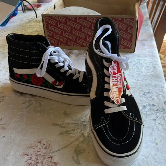 These Vans are black suede and have a custom done red rose. They are a size 9.5 - Picture 2 of 4